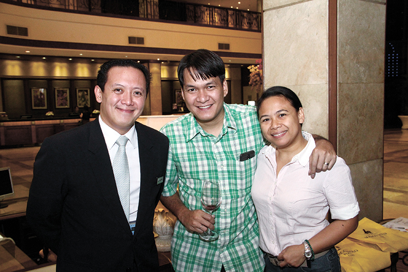 Events manager Josef Chiongbian and Gerald and Janice Yuvallos