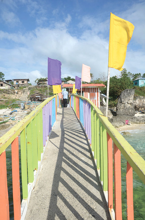 LET’S GO. Footbridge connecting the Gibitngil Funtastic Island to the mainland in Medellin, Cebu. (SUN.STAR FILE)