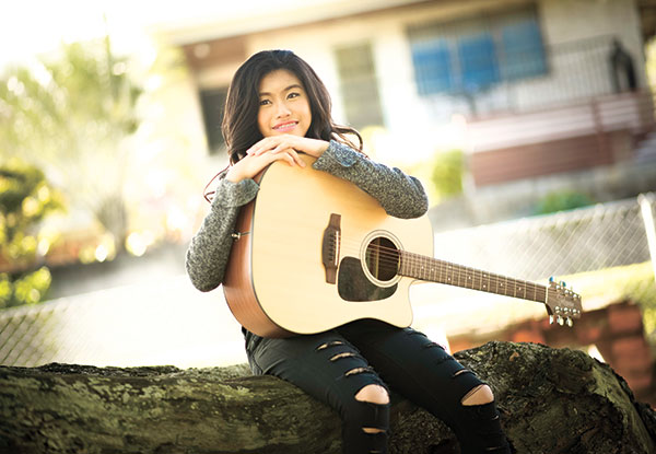 SONGWRITER. Young Ashley Go plays the guitar and ukulele, and writes songs about what people around her are going through. 