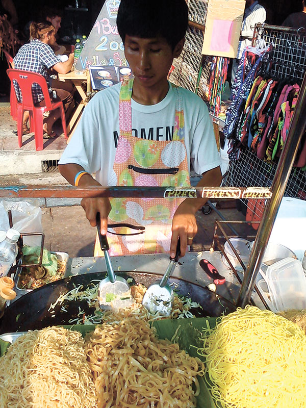 PAD THAI, ANYONE? A street vendor cooks ups some really good Pad Thai on Khaosan Road in Bangkok.