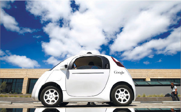 AGREED. Google’s new self-driving car during a demonstration at the Google campus in Mountain View, California. The federal government’s highway safety agency agrees with Google: Computers that will control the cars of the future can be considered their driver. The redefinition of “driver” is an important break for Google. (AP PHOTO)